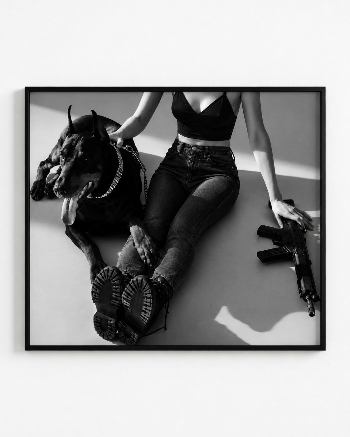 Guarded black-and-white artwork in a black frame
