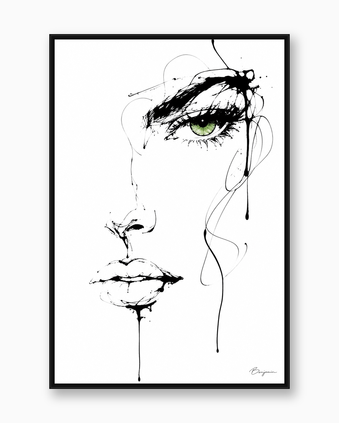 Inked black ink portrait artwork with emerald green eye in a black frame