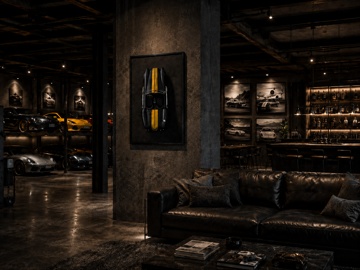 ShelBee Shelby Cobra wall art hanging in a luxury garage lounge