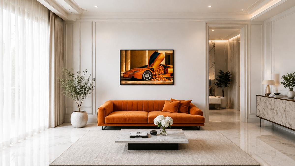 Vitamin C orange supercar wall art hanging above a couch in a modern living room